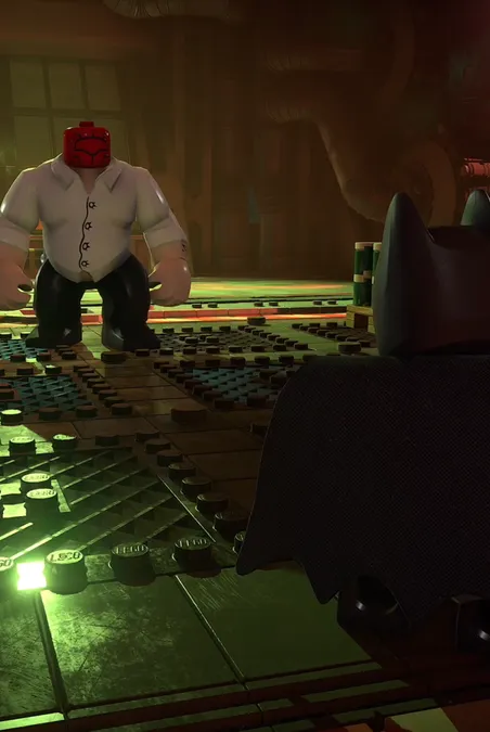 A large Red Hood Gang member and Batman stare each other down from across an industrial room, ready to fight.